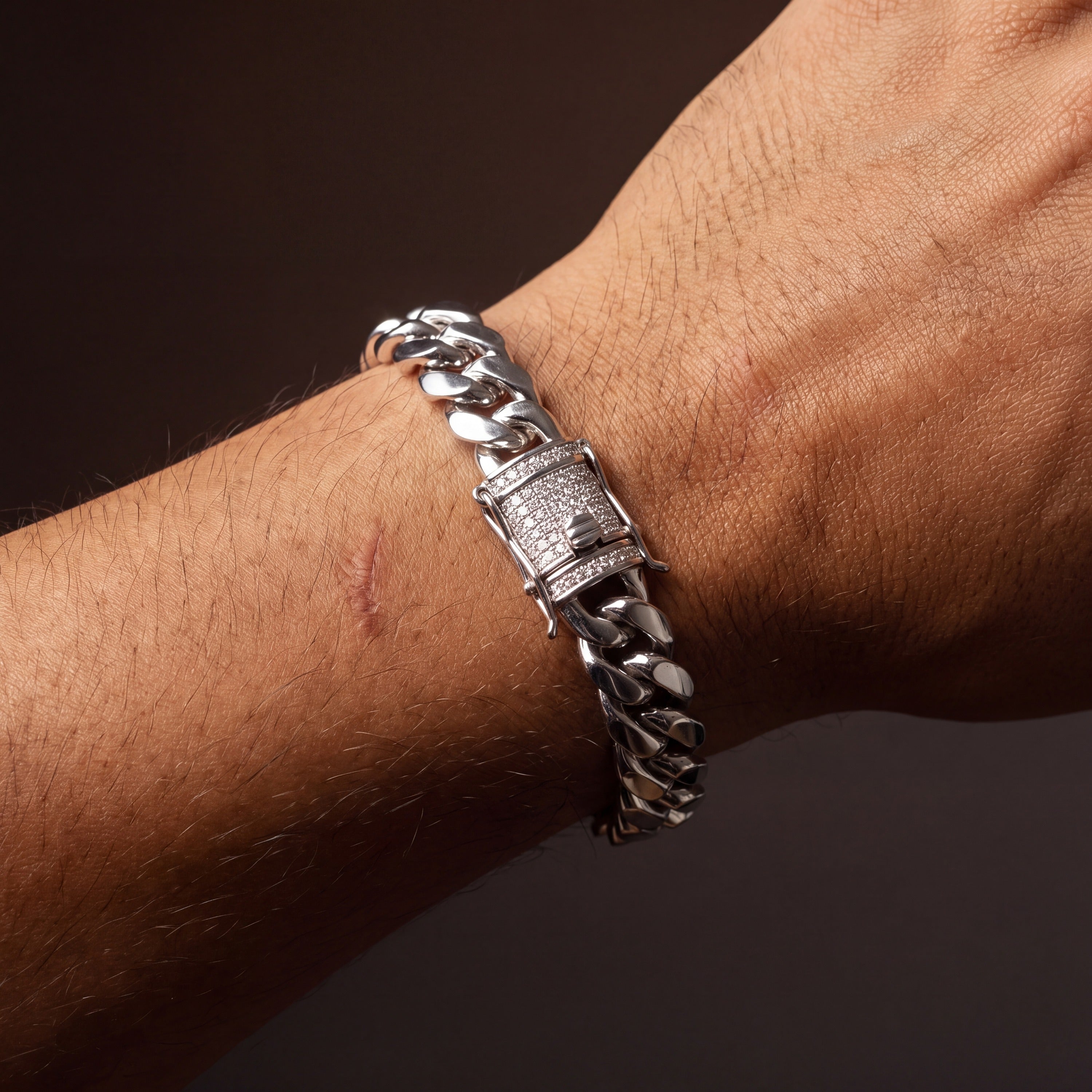 Stainless steel Cuban link bracelet seen from a second angle on the wrist